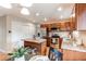 Modern kitchen with stainless steel appliances, granite countertops, and ample cabinet space at 8370 E Princeton Ave, Denver, CO 80237