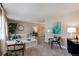 Bright living room with neutral tones, stylish furniture, and natural light at 8370 E Princeton Ave, Denver, CO 80237