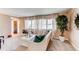 Spacious living area with large windows, comfortable seating, and elegant decor at 8370 E Princeton Ave, Denver, CO 80237