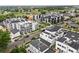 Aerial view of a modern townhome community with well-manicured landscaping at 1302 N Stuart St, Denver, CO 80204