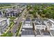 Contemporary black and white townhomes, set against a backdrop of mature trees and city views at 1302 N Stuart St, Denver, CO 80204
