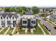 Exterior shot of modern townhomes with inviting front yards and contemporary design at 1302 N Stuart St, Denver, CO 80204