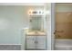 Simple bathroom with vanity and shower/tub combo at 10731 W 63Rd Ave # A, Arvada, CO 80004