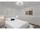 Bright bedroom featuring a large window and neutral tones at 10731 W 63Rd Ave # A, Arvada, CO 80004