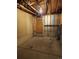 Clean garage interior with storage shelves, and convenient back door at 10731 W 63Rd Ave # A, Arvada, CO 80004