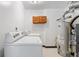 Laundry room with washer, dryer and storage cabinets at 10731 W 63Rd Ave # A, Arvada, CO 80004