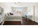 Bedroom with built-in shelving and desk area at 5458 W Calhoun Ave, Littleton, CO 80123