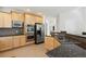 Large kitchen with double ovens, granite counters and island at 5458 W Calhoun Ave, Littleton, CO 80123