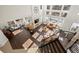 High-ceiling living room with hardwood floors and fireplace at 5458 W Calhoun Ave, Littleton, CO 80123