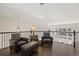 Bright sitting area overlooking the main floor at 5458 W Calhoun Ave, Littleton, CO 80123