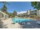 Relaxing community pool with inviting lounge chairs and nearby residential buildings, offering a perfect retreat at 910 S Walden St # 201, Aurora, CO 80017