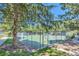 Community tennis court surrounded by lush greenery, inviting you to enjoy a match in a serene environment at 910 S Walden St # 201, Aurora, CO 80017