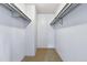 Spacious walk-in closet with built-in shelving providing ample storage space at 910 S Walden St # 201, Aurora, CO 80017