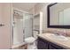 Bathroom with a shower, toilet, and updated sink and storage at 4400 S Quebec St # D203, Denver, CO 80237