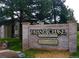 Brandy Chase at Eastmoor Park community sign on a brick base and professional landscaping at 4400 S Quebec St # D203, Denver, CO 80237