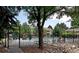 Community pool with lounge chairs and beautiful landscaping at 4400 S Quebec St # D203, Denver, CO 80237