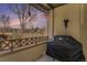 Cozy outdoor patio features a grill and golf decor with scenic views of the golf course at 11962 W Long Cir # 103, Littleton, CO 80127