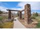 Stone pillars highlight the community walking path at 11962 W Long Cir # 103, Littleton, CO 80127