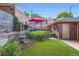 Backyard with patio, fountain, seating, and lush landscaping at 3530 E 8Th Ave, Denver, CO 80206