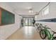 Finished basement showcasing multiple bikes and a chalkboard at 35 S Albion St, Denver, CO 80246