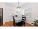 Breakfast nook featuring a modern light fixture, white shutters, and seating for four at 35 S Albion St, Denver, CO 80246