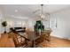 Dining room featuring hardwood floors, pendant lighting, and shutters at 35 S Albion St, Denver, CO 80246