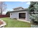 Exterior of detached garage featuring a side door and single car garage at 35 S Albion St, Denver, CO 80246