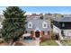 Aerial view of a charming brick home with well-manicured landscaping and a cozy patio area at 35 S Albion St, Denver, CO 80246