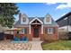 Charming brick home with a walkway leading to the front door and an outdoor patio with seating at 35 S Albion St, Denver, CO 80246
