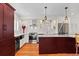 Kitchen featuring stainless steel appliances, dark cabinetry, granite countertops and white cabinets at 35 S Albion St, Denver, CO 80246