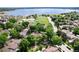 Aerial view showcases the proximity to the lake and neighborhood common areas at 7925 W Layton Ave # 605, Littleton, CO 80123