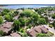 Overhead view showcases lush landscaping and walking paths near the community pond at 7925 W Layton Ave # 605, Littleton, CO 80123
