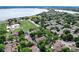A scenic view of the neighborhood showcases the nearby lake and green common areas at 7925 W Layton Ave # 605, Littleton, CO 80123