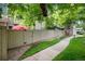Backyard features a walkway and a privacy fence for a secluded outdoor experience at 7925 W Layton Ave # 605, Littleton, CO 80123