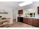 Bright kitchen featuring modern appliances, ample counter space, and convenient layout at 7925 W Layton Ave # 605, Littleton, CO 80123