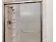 Updated shower with frosted glass sliding door and multiple storage shelves for convenience at 7925 W Layton Ave # 605, Littleton, CO 80123