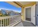 Open-air balcony with railing offering community views at 9471 Ashbury Cir # 202, Parker, CO 80134