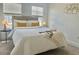 Cozy bedroom with a comfortable bed, soft lighting, and large windows for natural light at 9471 Ashbury Cir # 202, Parker, CO 80134