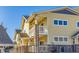 Exterior view of a multi-story building with a balcony at 9471 Ashbury Cir # 202, Parker, CO 80134