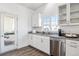Bright kitchen featuring granite countertops, stainless steel appliances, and ample cabinet space at 9471 Ashbury Cir # 202, Parker, CO 80134