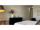 Serene bedroom with a sleek dresser, modern decor, and a tranquil atmosphere at 9471 Ashbury Cir # 202, Parker, CO 80134