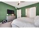Lovely main bedroom featuring an accent wall and lots of natural light at 4863 River Landing Ave, Firestone, CO 80504