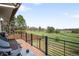 Beautiful backyard view with a deck and golf course; perfect for outdoor relaxation and enjoyment at 3930 S Pinehurst Cir, Denver, CO 80235