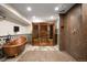 Unique bathroom featuring a copper tub, a sauna, and unique star-patterned accent wall tiles at 3930 S Pinehurst Cir, Denver, CO 80235
