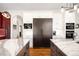 Modern kitchen showcasing double islands, stainless steel appliances, and custom cabinets at 3930 S Pinehurst Cir, Denver, CO 80235
