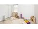 Bright room shows an inviting space that can easily be turned into a guest room, yoga studio, or bonus room at 661 Snowberry St, Longmont, CO 80503
