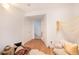 Bright basement features hard wood floors and an open doorway to a staircase at 661 Snowberry St, Longmont, CO 80503