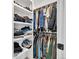 Spacious walk-in closet with ample shelving and hanging space at 1403 Yates St, Denver, CO 80204