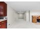 Open basement area featuring neutral carpet and a fireplace at 2601 N Clayton St, Denver, CO 80205