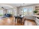 Open dining area with hardwood floors and bright natural light at 2601 N Clayton St, Denver, CO 80205